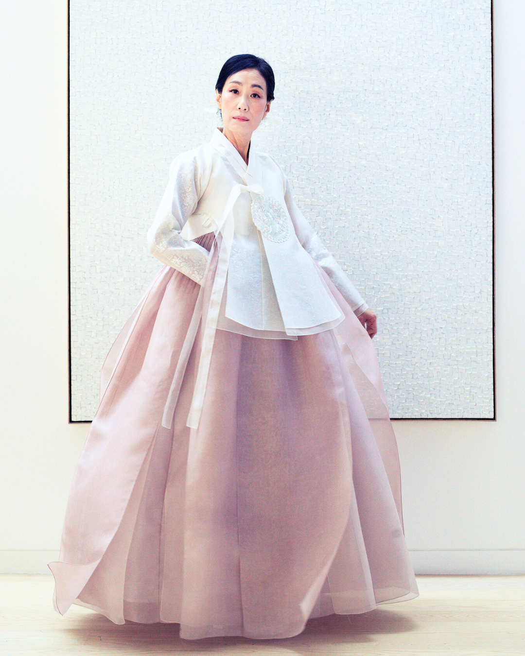 White long sleeved dangui (top) & Double layered panel skirt with embroidery on back